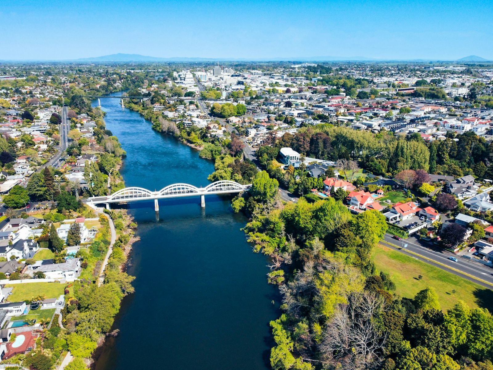 Drone view over the Waikato River and Fairfield Bridge with Hamilton city beyond